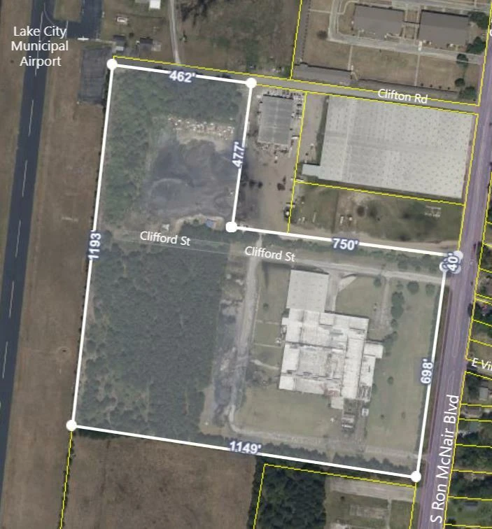 Former Talon Zipper Manufacturing/Warehouse - 105,251 SF - Adjacent to Runway with Potential IOS Land - 20 +/- Acres - Opportunity Zone - OWNER FINANCING 