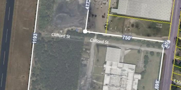 Former Talon Zipper Manufacturing/Warehouse - 105,251 SF - Adjacent to Runway with Potential IOS Land - 20 +/- Acres - Opportunity Zone - OWNER FINANCING 