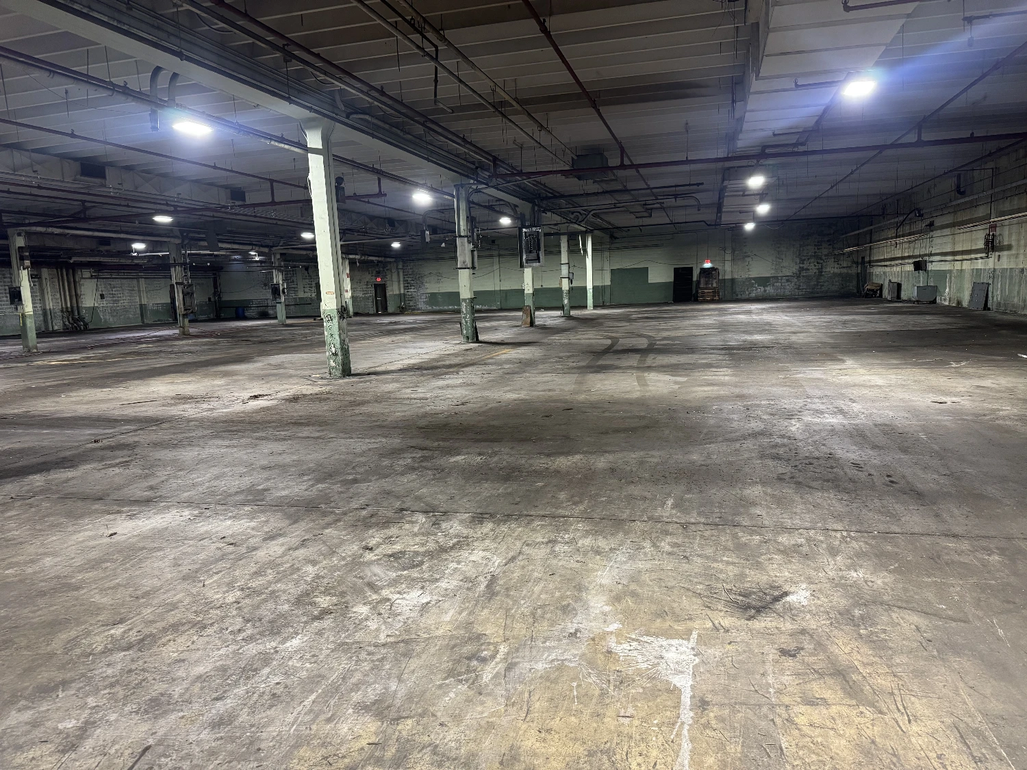 Former Talon Zipper Manufacturing/Warehouse - 105,251 SF - Adjacent to Runway with Potential IOS Land - 20 +/- Acres - Opportunity Zone - OWNER FINANCING 