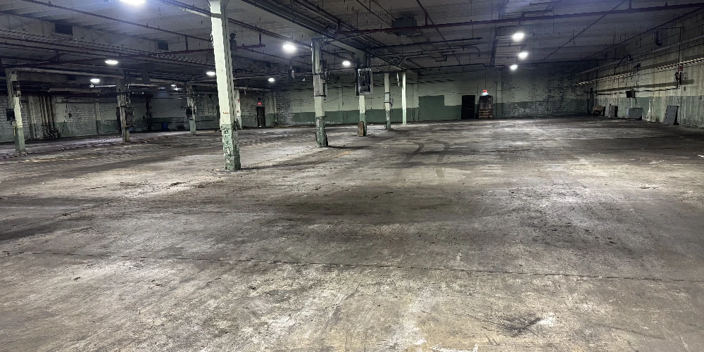 Former Talon Zipper Manufacturing/Warehouse - 105,251 SF - Adjacent to Runway with Potential IOS Land - 20 +/- Acres - Opportunity Zone - OWNER FINANCING 