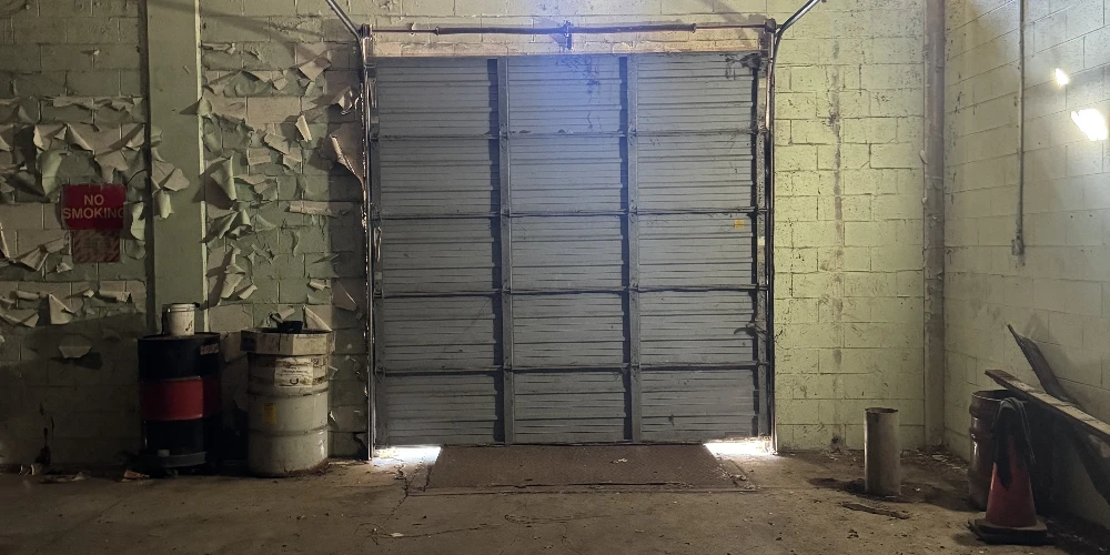 Former Talon Zipper Manufacturing/Warehouse - 105,251 SF - Adjacent to Runway with Potential IOS Land - 20 +/- Acres - Opportunity Zone - OWNER FINANCING 
