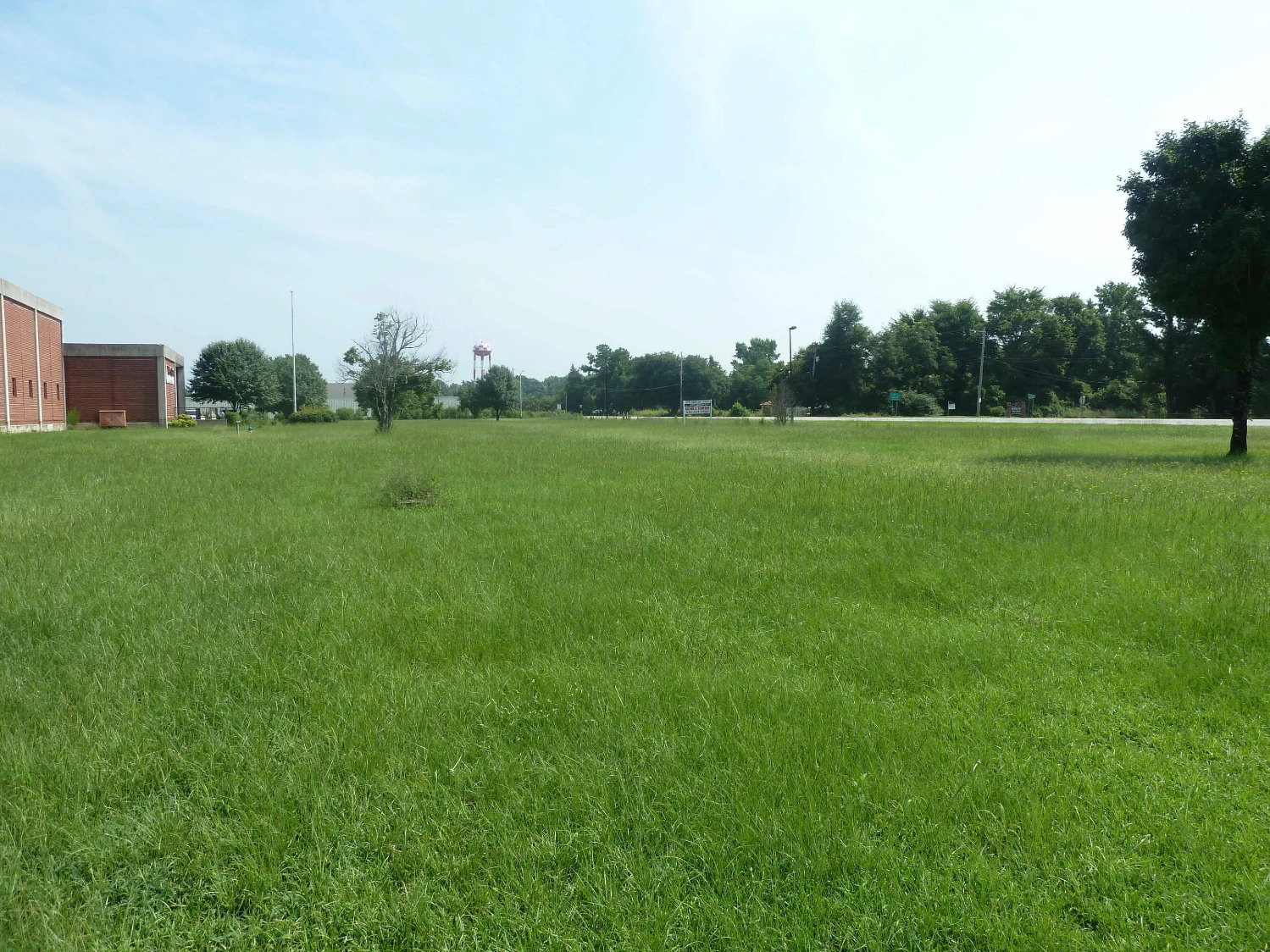 Former Talon Zipper Manufacturing/Warehouse - 105,251 SF - Adjacent to Runway with Potential IOS Land - 20 +/- Acres - Opportunity Zone - OWNER FINANCING 