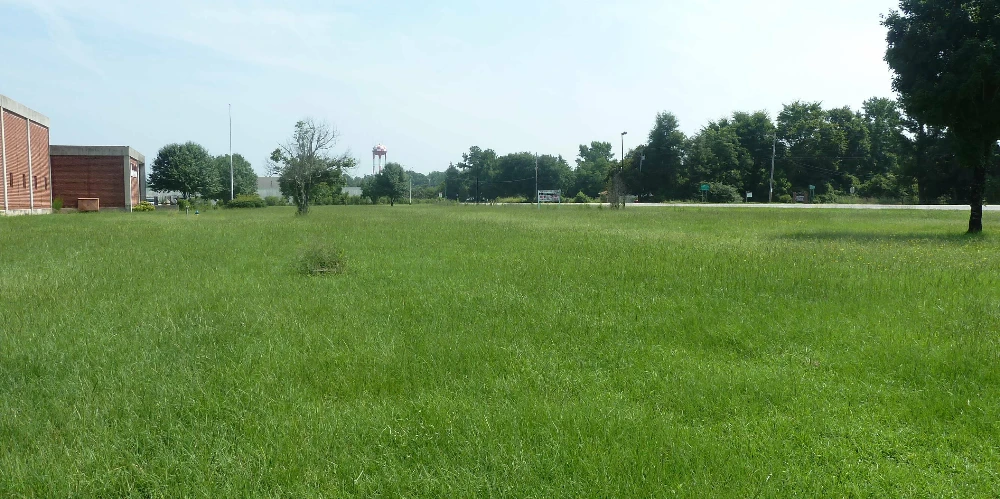 Former Talon Zipper Manufacturing/Warehouse - 105,251 SF - Adjacent to Runway with Potential IOS Land - 20 +/- Acres - Opportunity Zone - OWNER FINANCING 