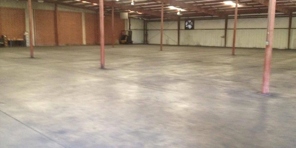 Former Talon Zipper Manufacturing/Warehouse - 105,251 SF - Adjacent to Runway with Potential IOS Land - 20 +/- Acres - Opportunity Zone - OWNER FINANCING 