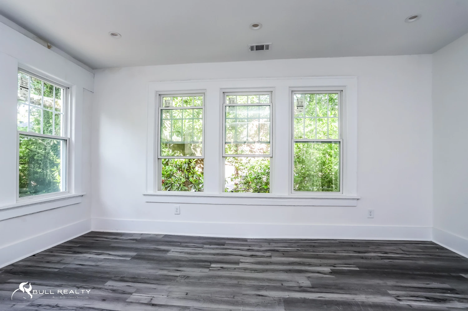Newly Renovated Intown 10-Unit Apartment Building With Extra Land for Potential Development