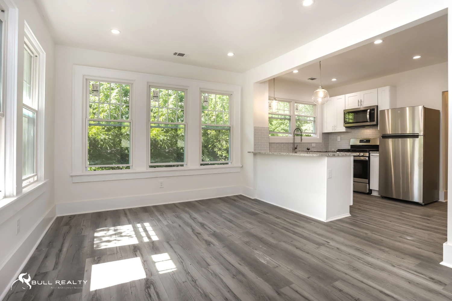 Newly Renovated Intown 10-Unit Apartment Building With Extra Land for Potential Development