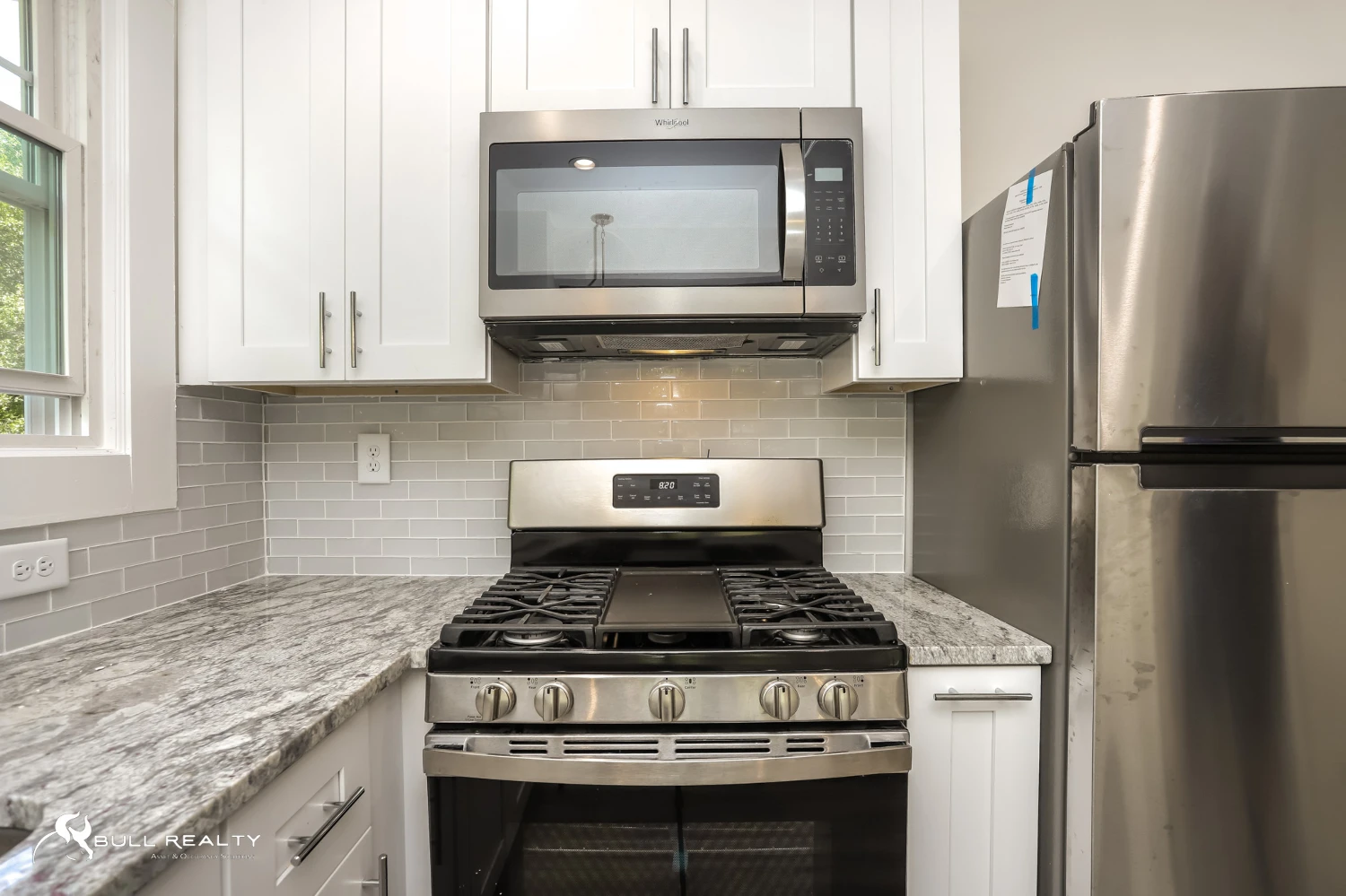 Newly Renovated Intown 10-Unit Apartment Building With Extra Land for Potential Development