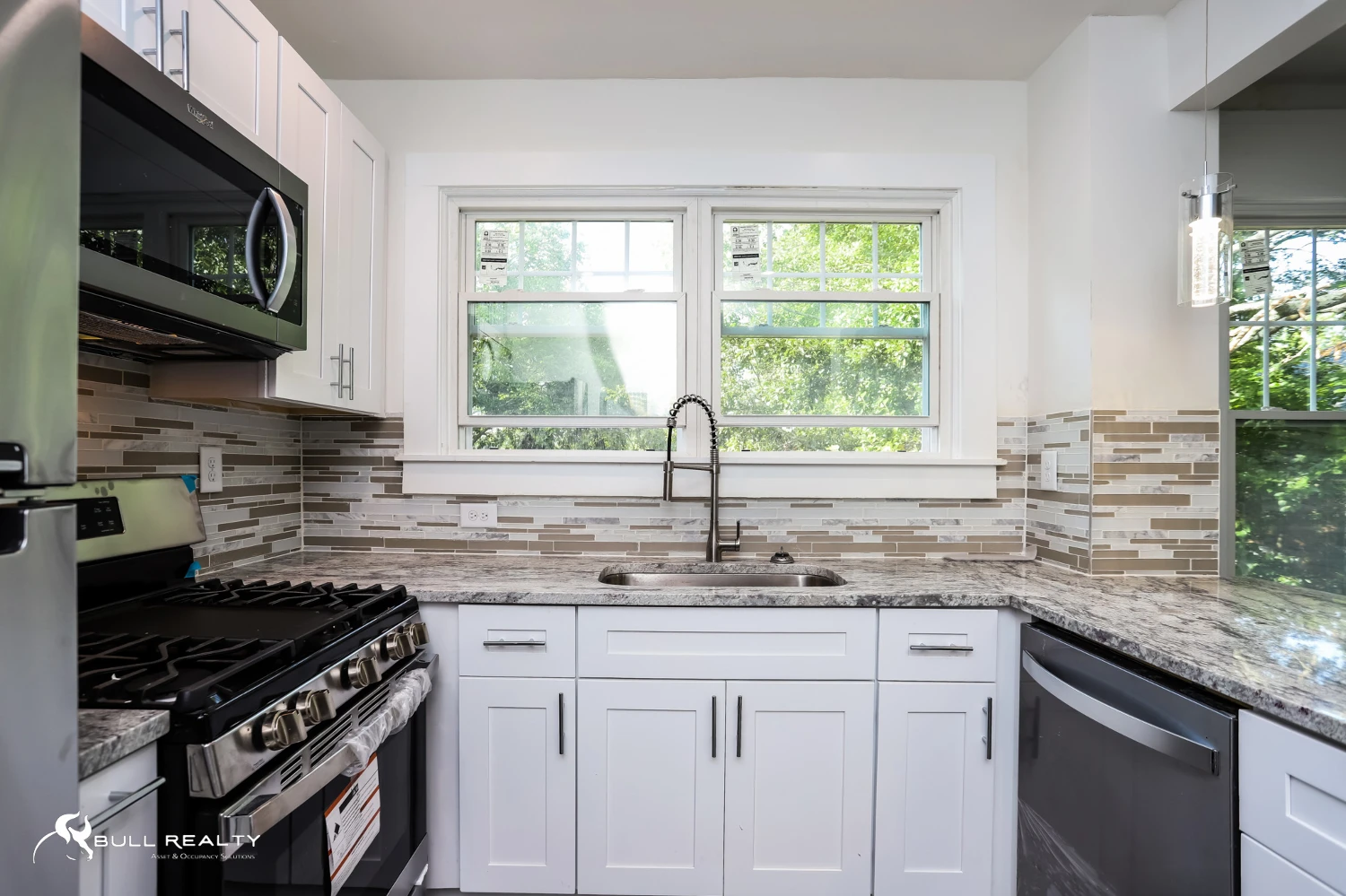 Newly Renovated Intown 10-Unit Apartment Building With Extra Land for Potential Development