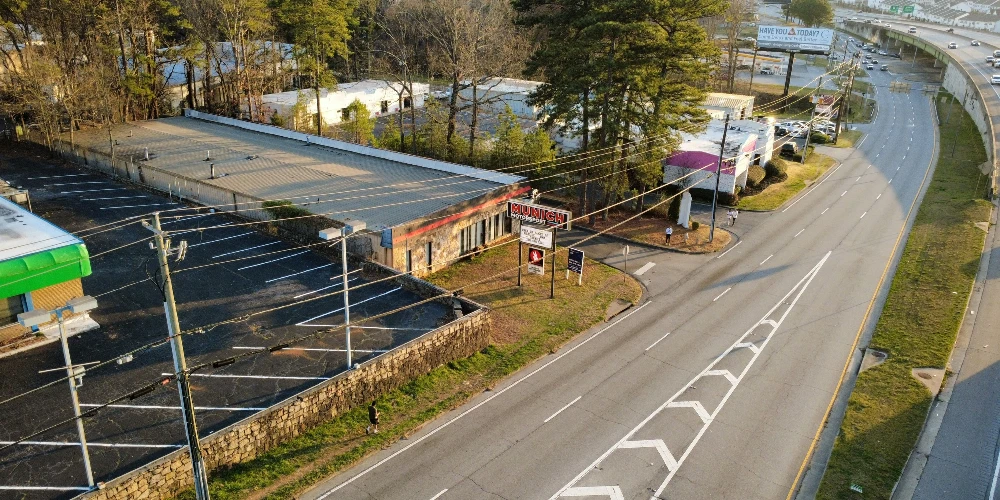 Freestanding Warehouse Building with Retail Exposure | ±7,500 SF | For Sale