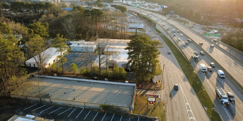 Freestanding Warehouse Building with Retail Exposure | ±7,500 SF | For Sale