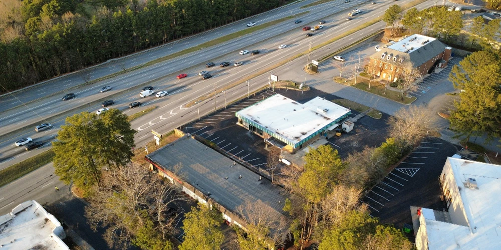Freestanding Warehouse Building with Retail Exposure | ±7,500 SF | For Sale