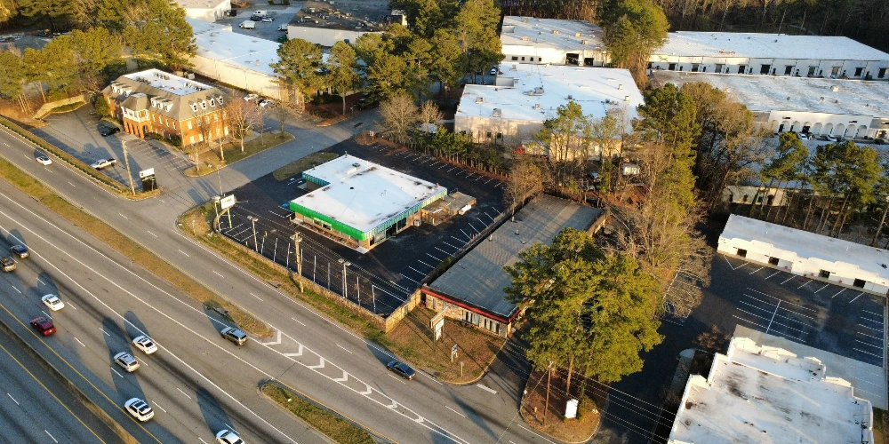 Freestanding Warehouse Building with Retail Exposure | ±7,500 SF | For Sale