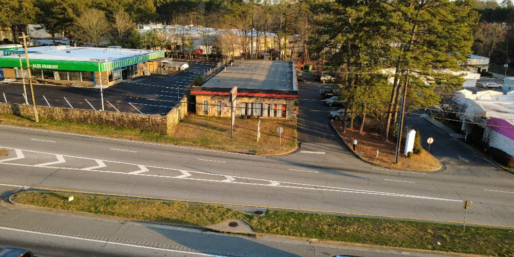Freestanding Warehouse Building with Retail Exposure | ±7,500 SF | For Sale