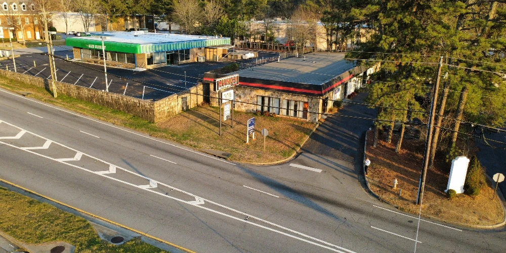 Freestanding Warehouse Building with Retail Exposure | ±7,500 SF | For Sale
