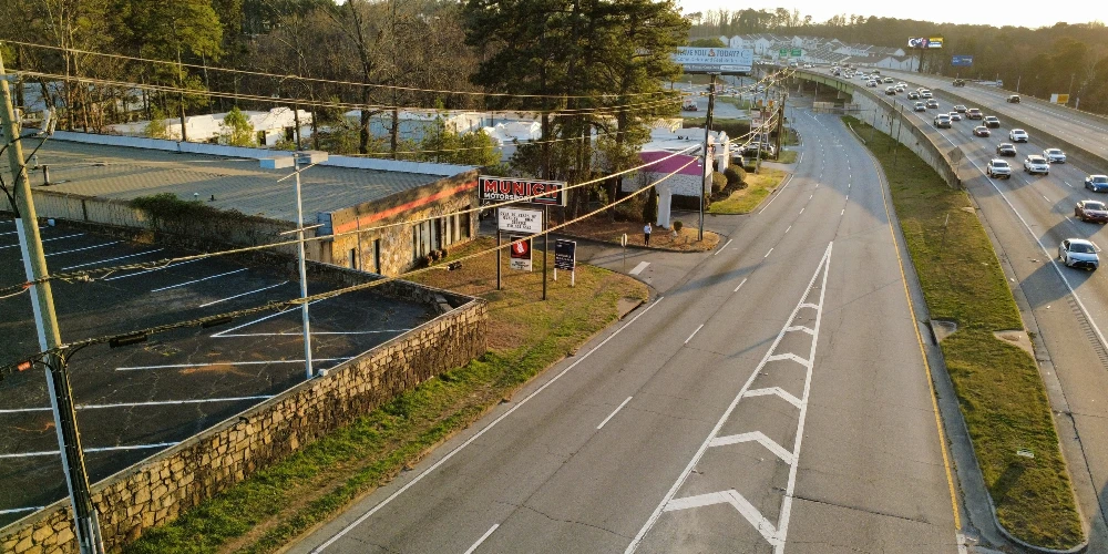Freestanding Warehouse Building with Retail Exposure | ±7,500 SF | For Sale