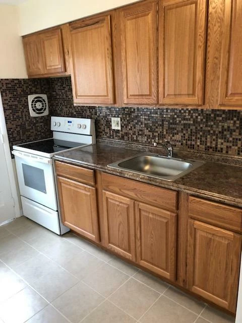 Fully Occupied 12-Unit Apartment Building with Value-Add Potential