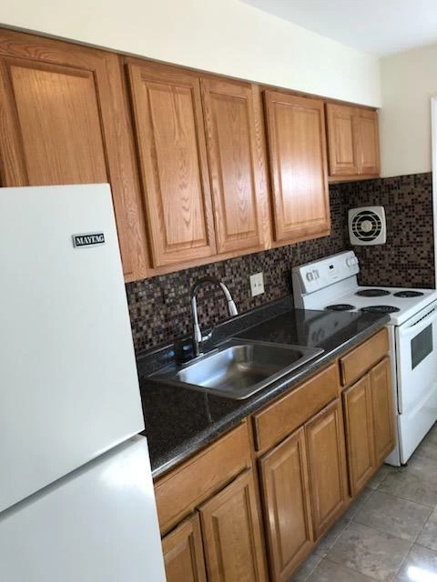 Fully Occupied 12-Unit Apartment Building with Value-Add Potential