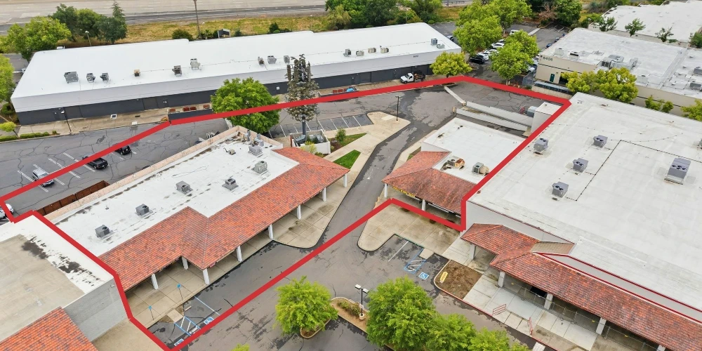 Value Add Strip Center with Cell Tower