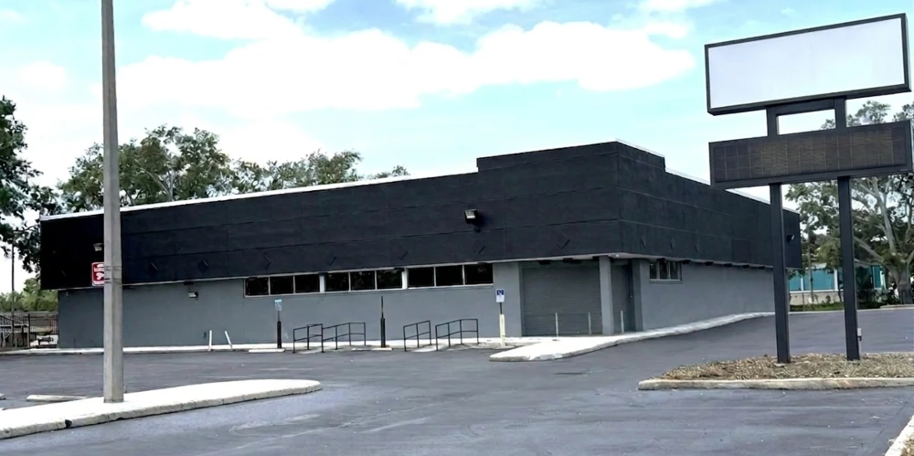 PREMIER TAMPA SHOWROOM- 13,296 SF Freestanding Building 1.42 ACRES  Signalized corner  LED Billboard Signage
