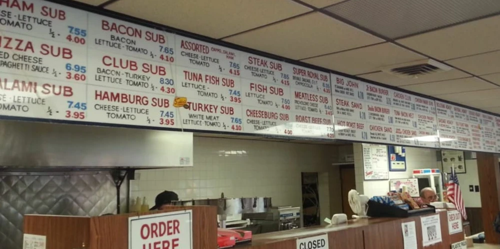 3513 Harlem Rd - John & Mary’s A-Bomb Subs + Real Estate