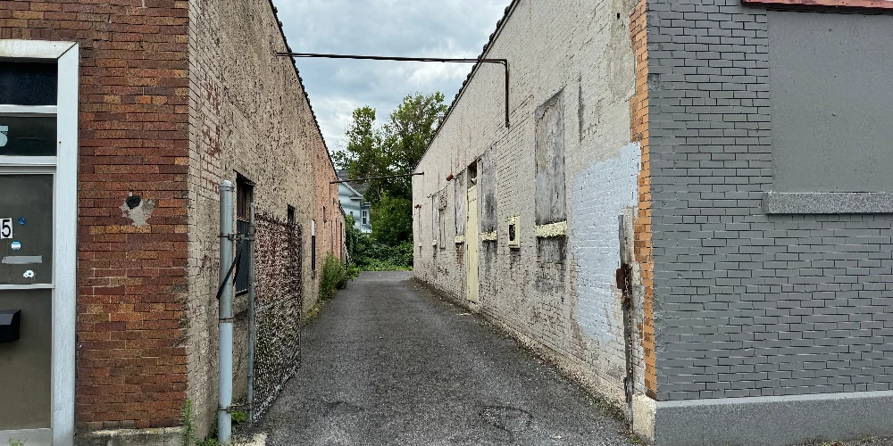 Syracuse Mixed-Use Corner Building – Retail Income + Residential Conversion