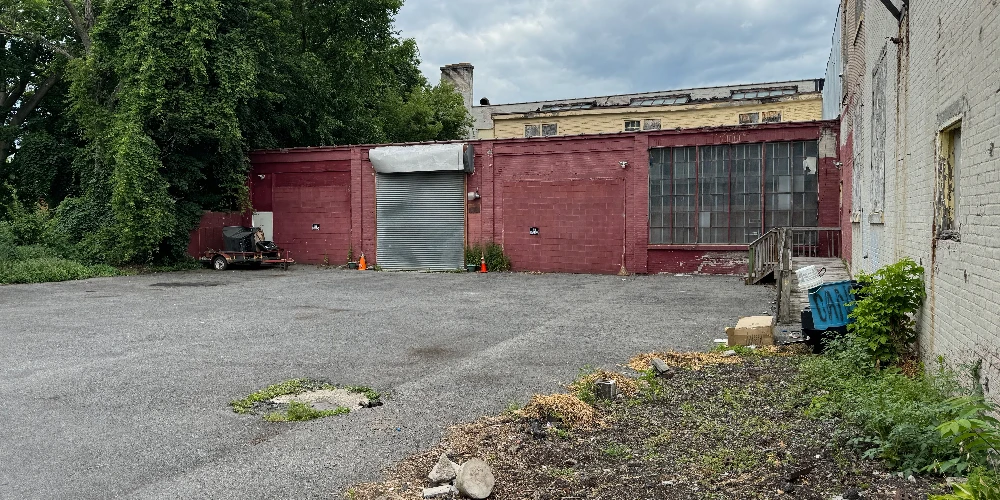 Syracuse Mixed-Use Corner Building – Retail Income + Residential Conversion