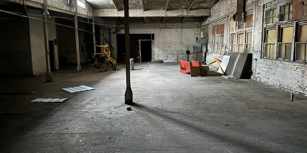 Syracuse Mixed-Use Corner Building – Retail Income + Residential Conversion