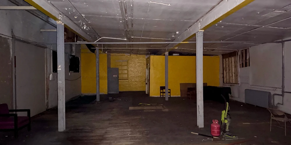 Syracuse Mixed-Use Corner Building – Retail Income + Residential Conversion