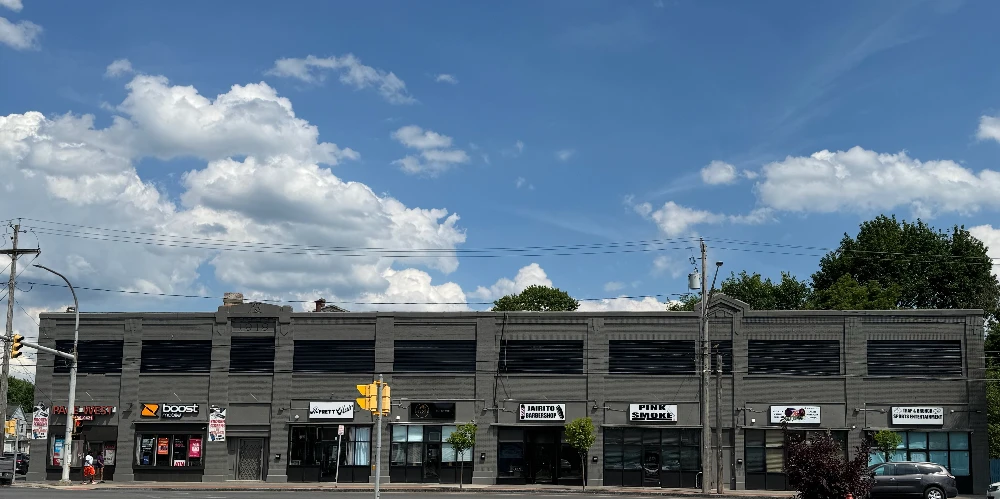 Syracuse Mixed-Use Corner Building – Retail Income + Residential Conversion