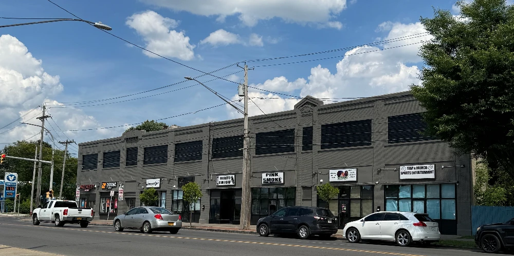 Syracuse Mixed-Use Corner Building – Retail Income + Residential Conversion
