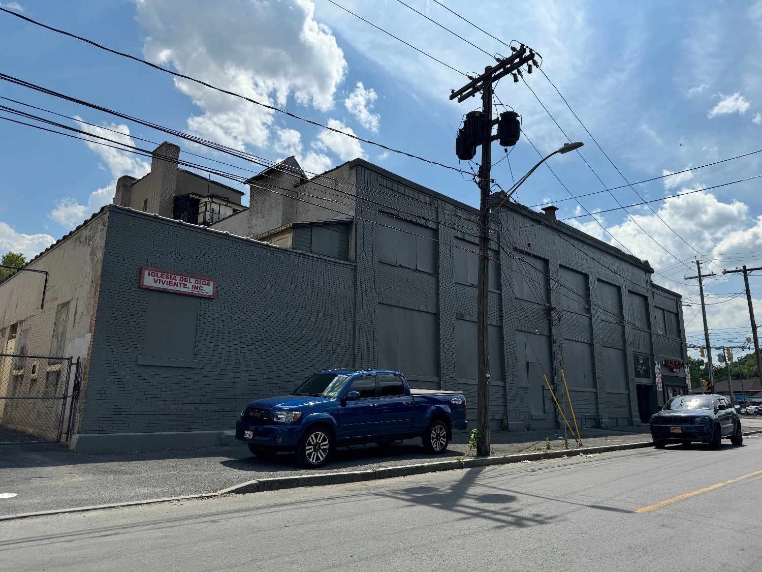 Syracuse Mixed-Use Corner Building – Retail Income + Residential Conversion