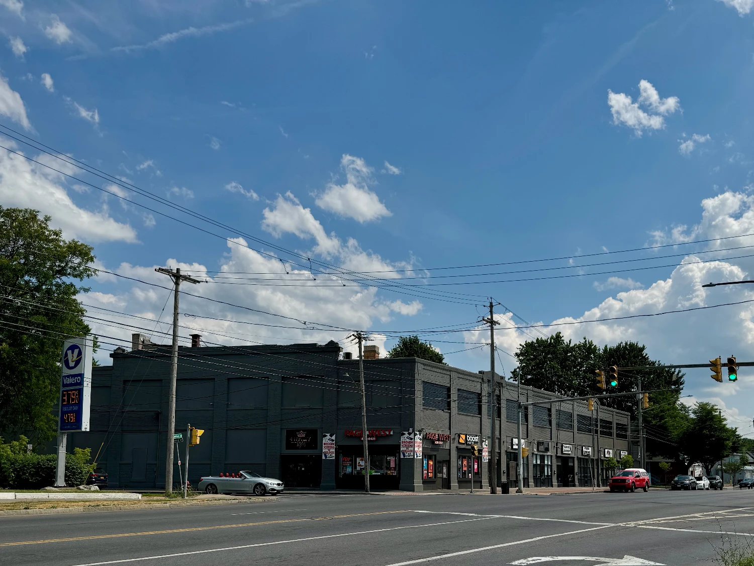 Syracuse Mixed-Use Corner Building – Retail Income + Residential Conversion