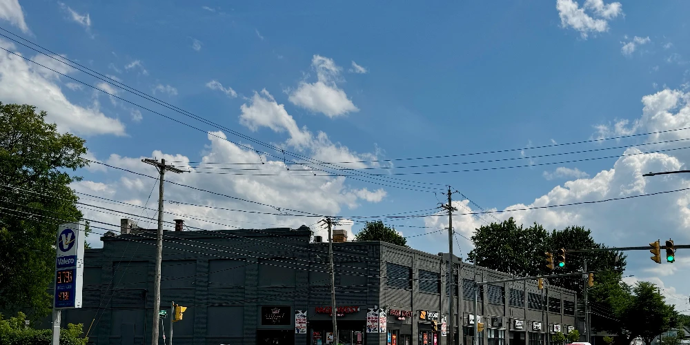 Syracuse Mixed-Use Corner Building – Retail Income + Residential Conversion