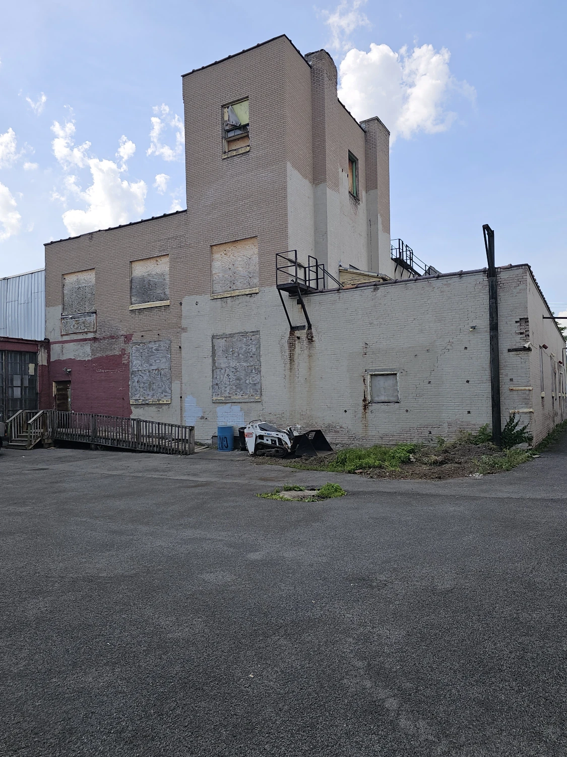 Syracuse Mixed-Use Corner Building – Retail Income + Residential Conversion