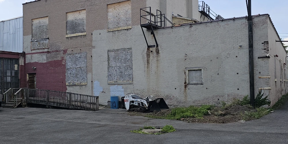Syracuse Mixed-Use Corner Building – Retail Income + Residential Conversion