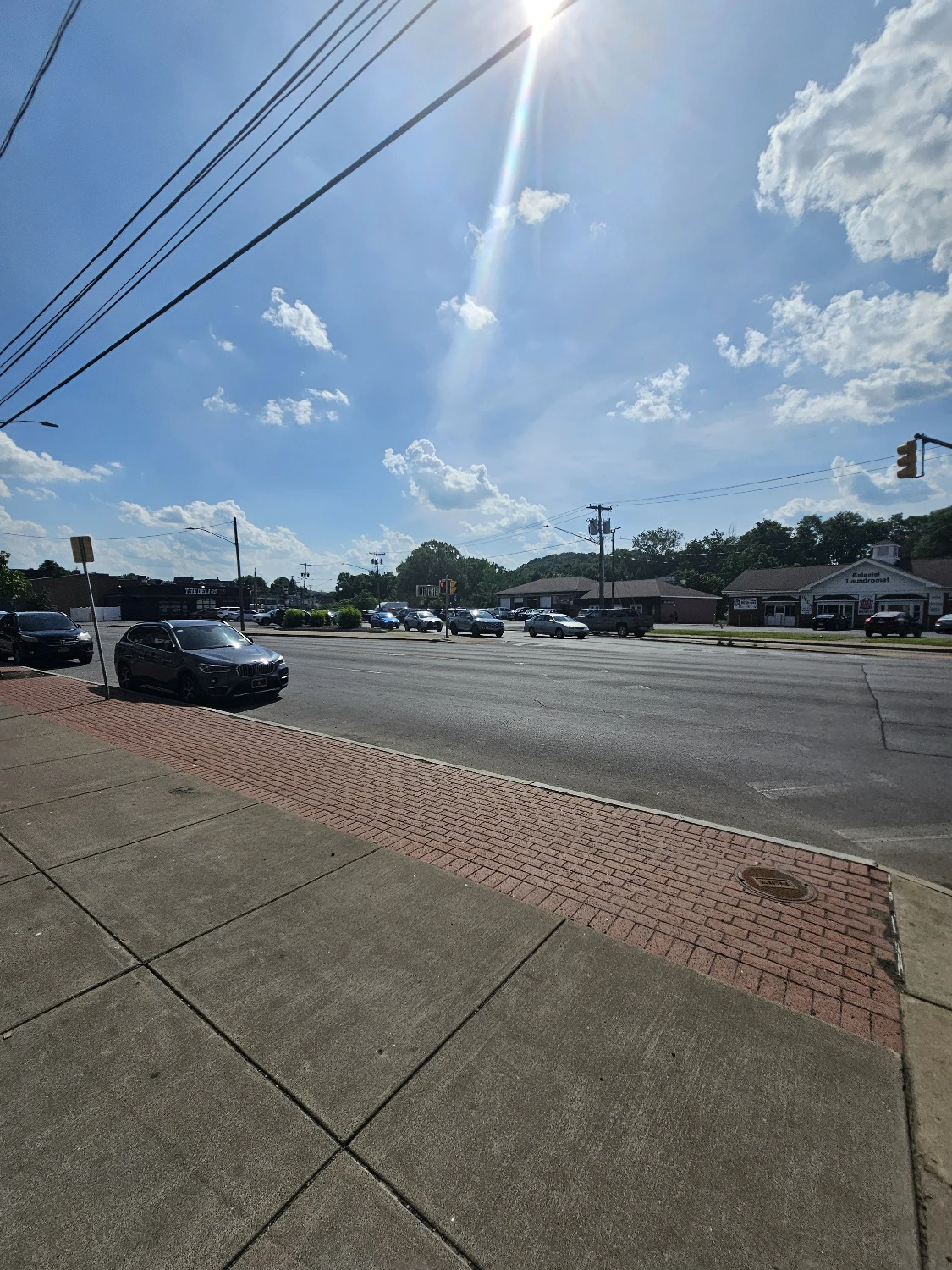 Syracuse Mixed-Use Corner Building – Retail Income + Residential Conversion
