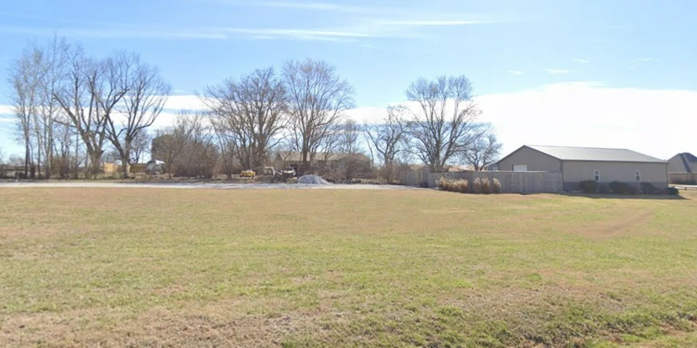 1.97 ACRES IN LOWELL, AR WITH SHOP AND HOME