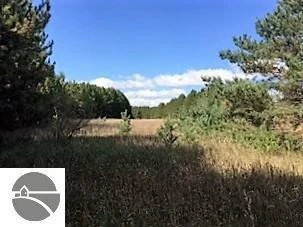 Prime 72-Acre Development Opportunity Bordering City of Cadillac & Evergreen Golf Course