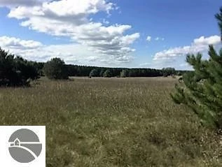 Prime 72-Acre Development Opportunity Bordering City of Cadillac & Evergreen Golf Course