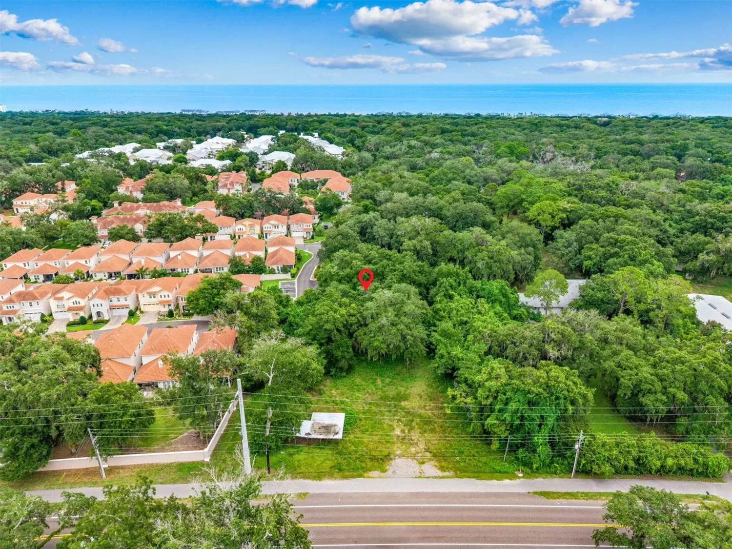 Prime 5.07-Acre Coastal Flexible Investment: Dual-Zoned Commercial & Residential Land Near Amelia Island