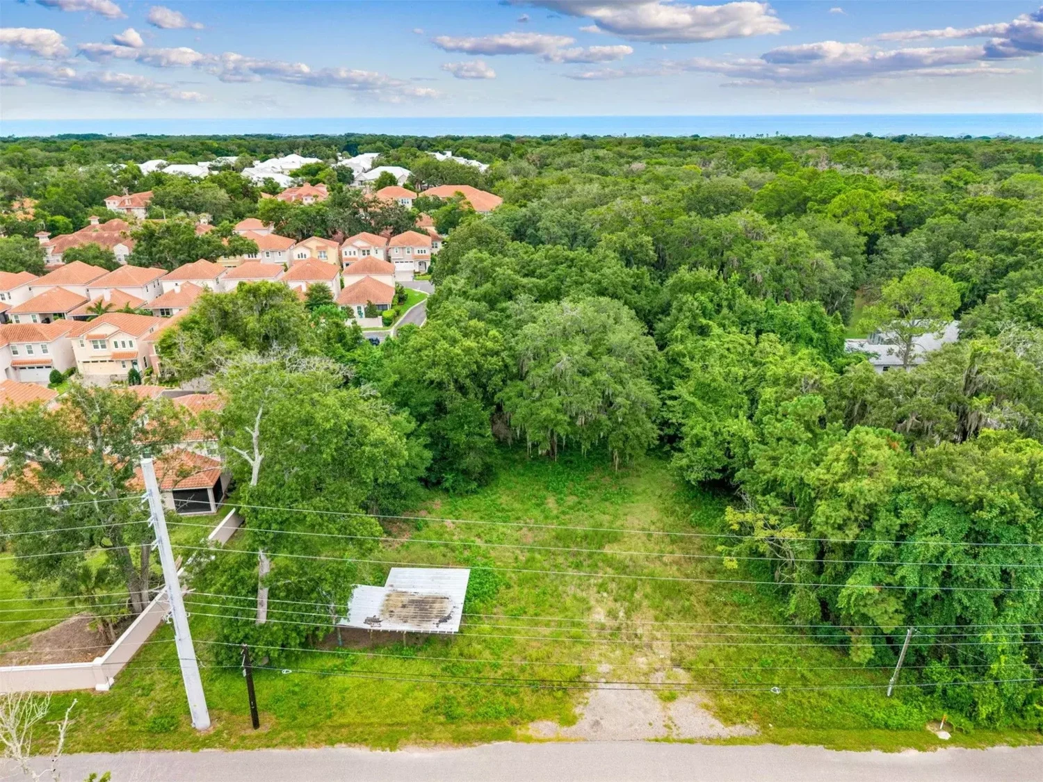 Prime 5.07-Acre Coastal Flexible Investment: Dual-Zoned Commercial & Residential Land Near Amelia Island
