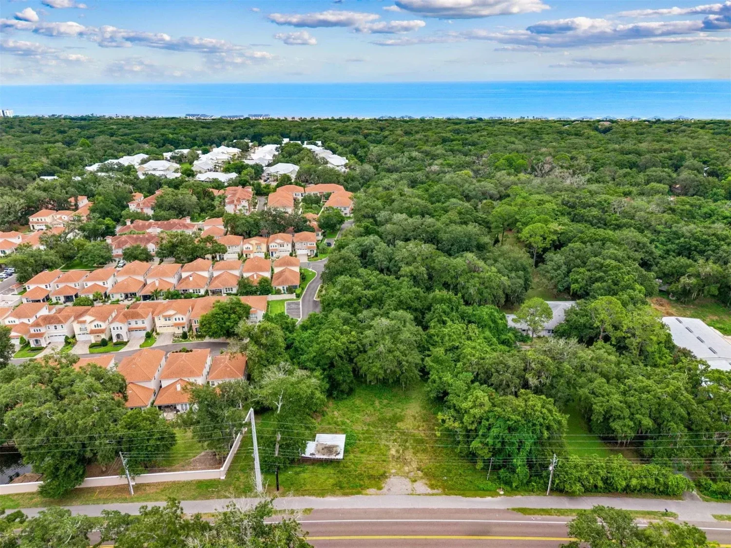 Prime 5.07-Acre Coastal Flexible Investment: Dual-Zoned Commercial & Residential Land Near Amelia Island